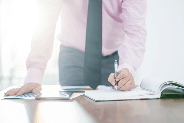 salesperson doing paperwork